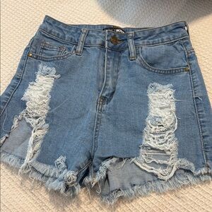 Fashion Nova Light Blue Ripped Jean Shorts